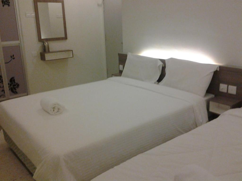 Qish Hotel Malakka Oda fotoğraf