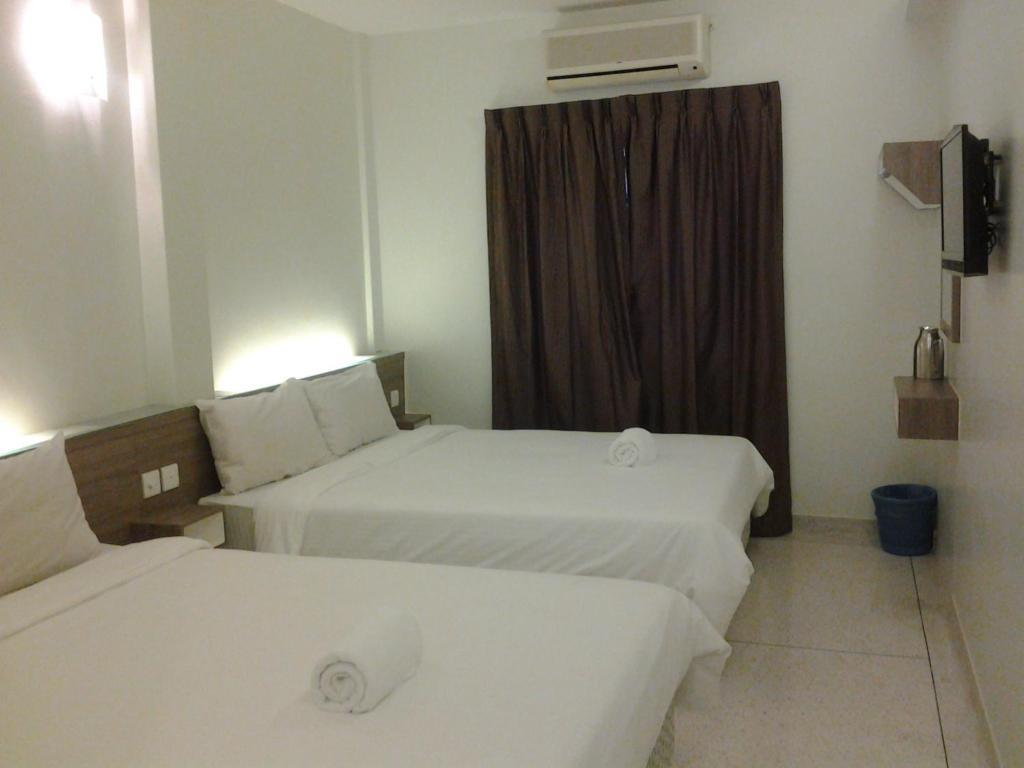 Qish Hotel Malakka Oda fotoğraf